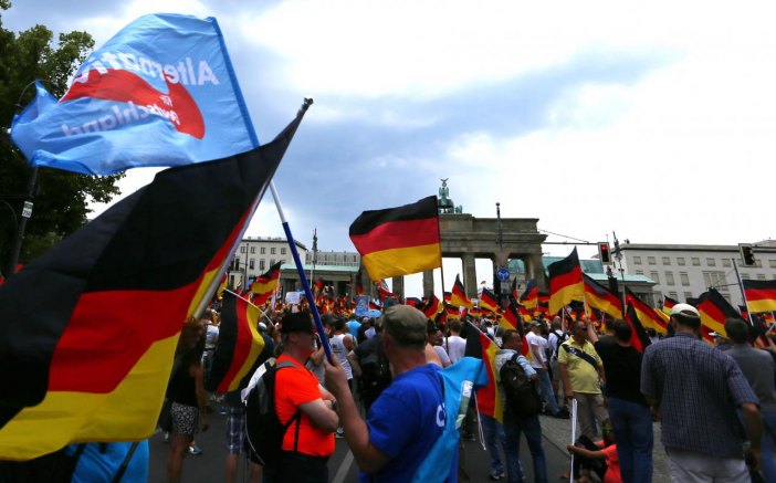 Supporters of the Anti-immigration party Alternative for Germany (AfD) hold a protest in Berlin