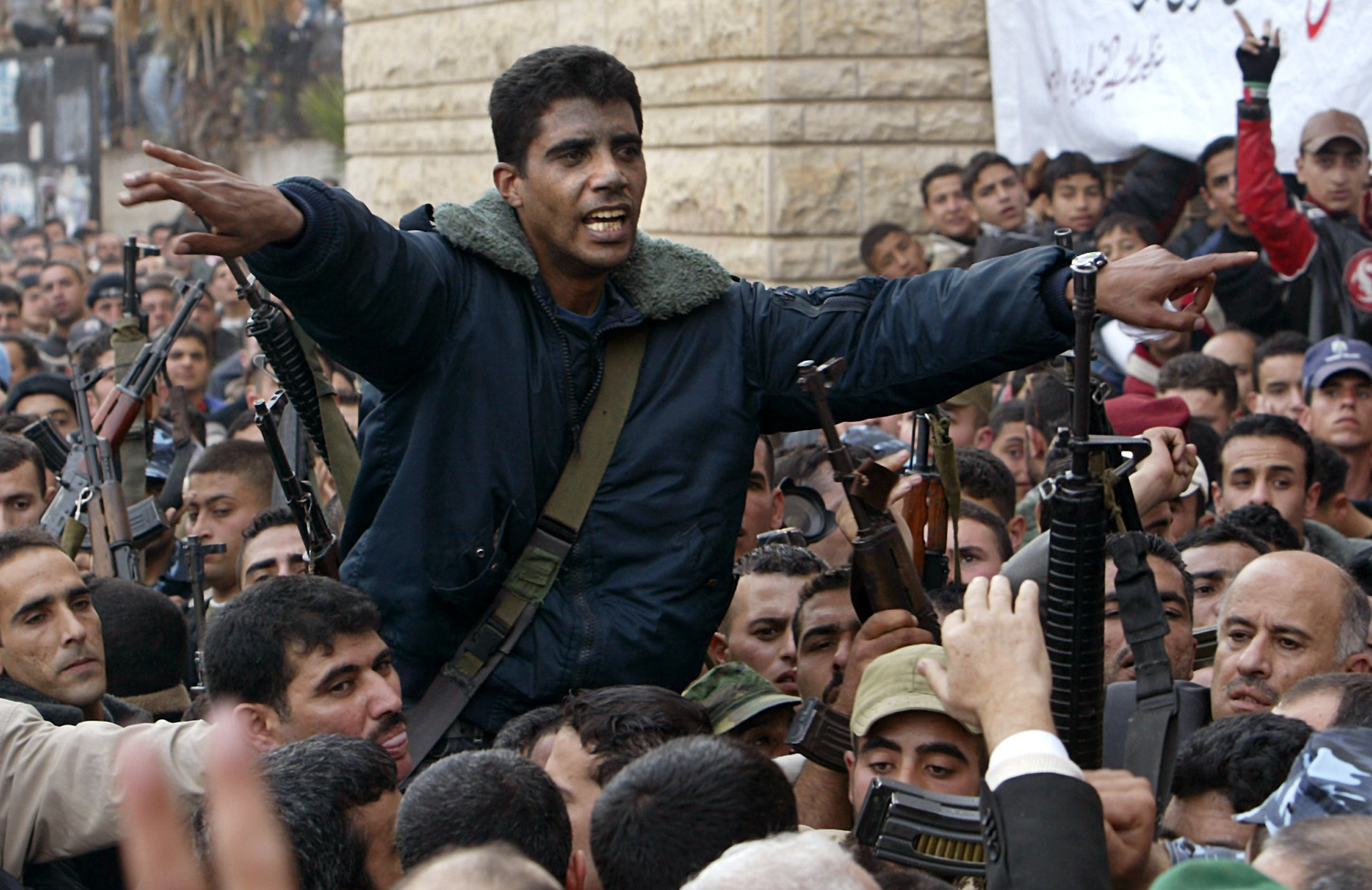 West Bank commander of the militant Al Aqsa Martyrs Brigades Zakaria Zubeid is carried on the …