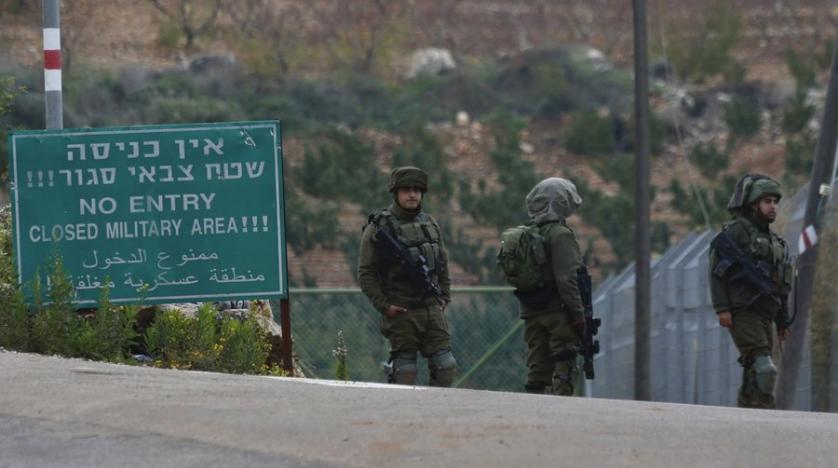 israeli_soldiers_block_the_road_on_the_border_with_lebanon_in_the_northern_town_of_metula_december_4_2018._ap