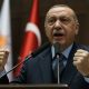 Turkish President Recep Tayyip Erdogan addresses members of ruling AKP