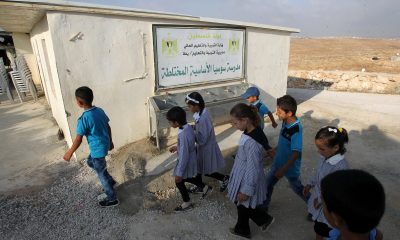 2017_8-24-Palestinian-boys-and-girls-arrive-at-the-schooGettyImages-485070018