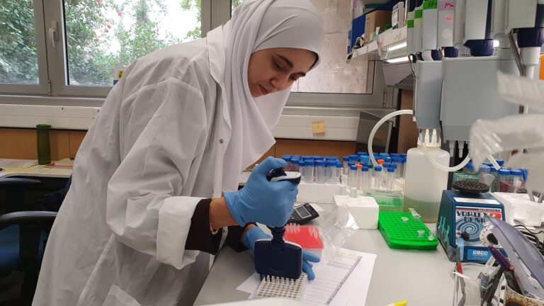 Dr.-Sharkia-at-the-lab-preparing-samples-for-DNA-sequencing-768×432