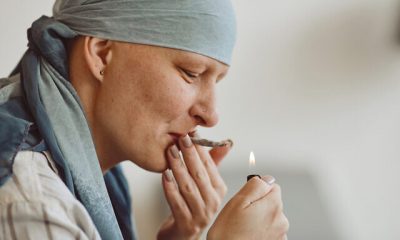 Bald Woman Smoking Marijuana