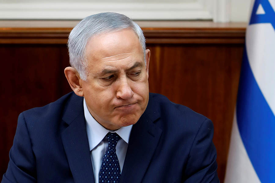 FILE PHOTO: Israeli Prime Minister Benjamin Netanyahu opens the weekly cabinet meeting at his Jerusalem office