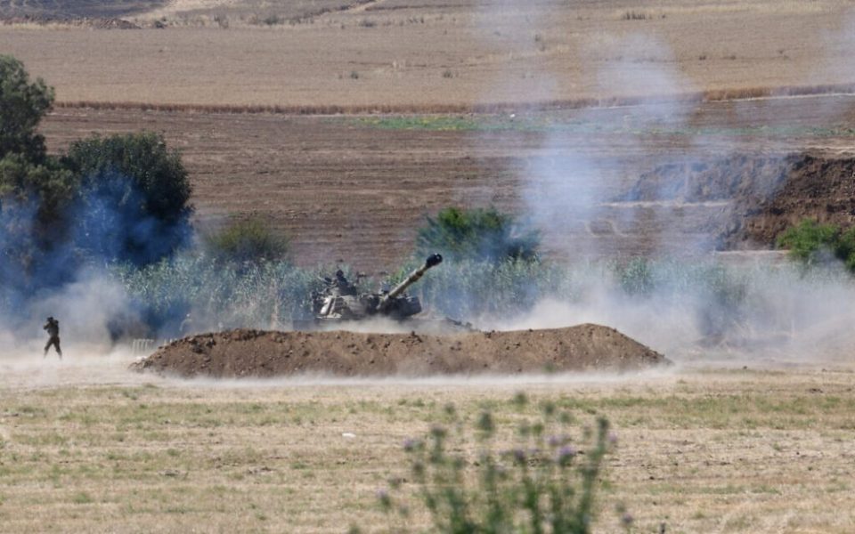 An IDF artillery unit fires towards Gaza Strip near the Israel-Gaza border
