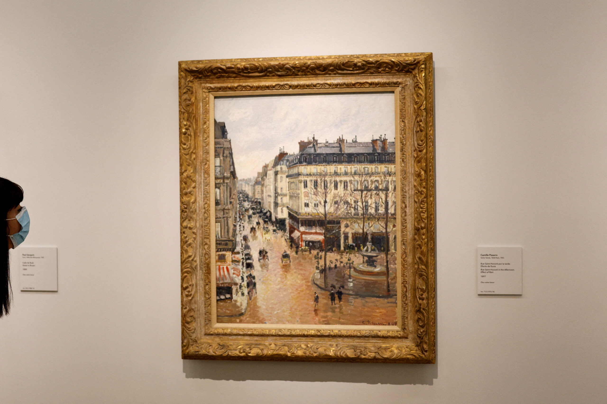 FILE PHOTO: Camille Pissarro’s «Rue Saint-Honore in the Afternoon. Effect of Rain, 1897» is displayed at Thyssen-Bornemisza museum in Madrid