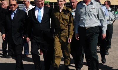 Gilad-Shalit-with-Prime-Minister-of-Israel-Benjamin-Netanyahu-and-Ehud-Barak-Tel-Nof-Airbase-October-11-2011
