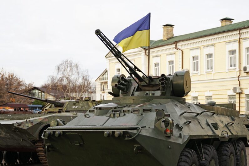 Army,Troops,Transporter,And,Tank,With,Ukrainian,Flag,,Ukraine,-