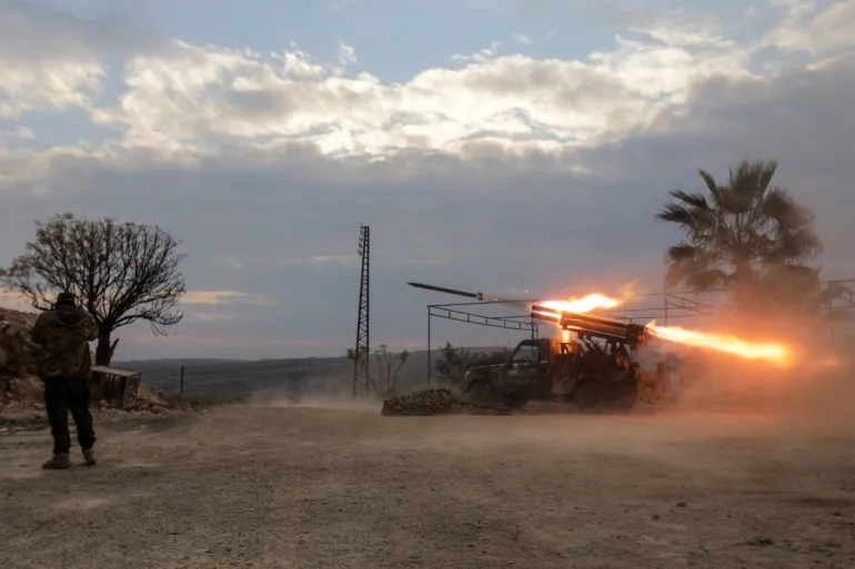AFP__20241204__36PE8MB__v3__HighRes__TopshotSyriaConflict-1733394366