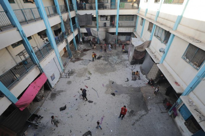 This-UNRWA-school-in-Nuseirat-in-the-central-Gaza-Strip-was-attacked-from-the-air-on-October-14-2024-following-reports-of-its-being-a-Hamas-enclave.-696×464