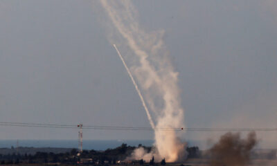 Israel’s Iron Dome anti-missile system launches defensive rockets to intercept rockets launched from the Gaza Strip towards Israel, as seen from near Sderot