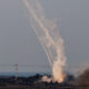 Israel’s Iron Dome anti-missile system launches defensive rockets to intercept rockets launched from the Gaza Strip towards Israel, as seen from near Sderot
