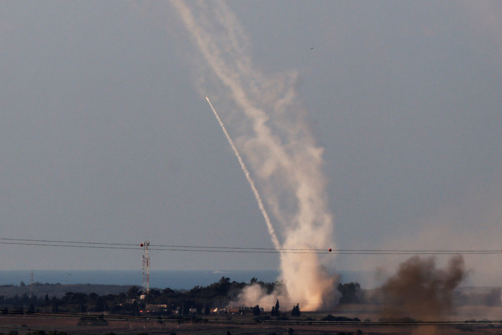 Israel’s Iron Dome anti-missile system launches defensive rockets to intercept rockets launched from the Gaza Strip towards Israel, as seen from near Sderot