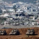 2025-01-22T060434Z_1_LYNXNPEL0L053_RTROPTP_4_ISRAEL-PALESTINIANS-GAZA-CEASEFIRE-BORDER-scaled