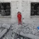 palestinian-girl-cries-stands-debris-101547890