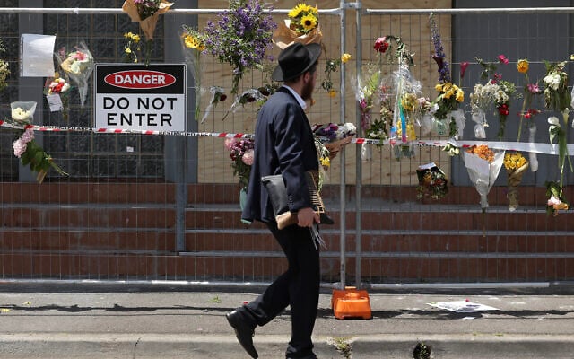 AFP__20241209__36PW6N9__v1__HighRes__AustraliaReligionPoliticsFirePolice-640×400